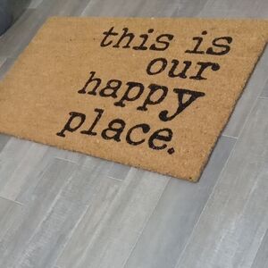 Tan Welcome Mat with Black Text